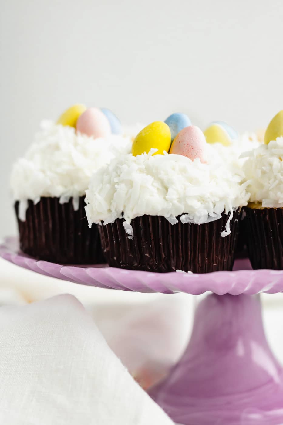 coconut lemon cupcakes on cake stand